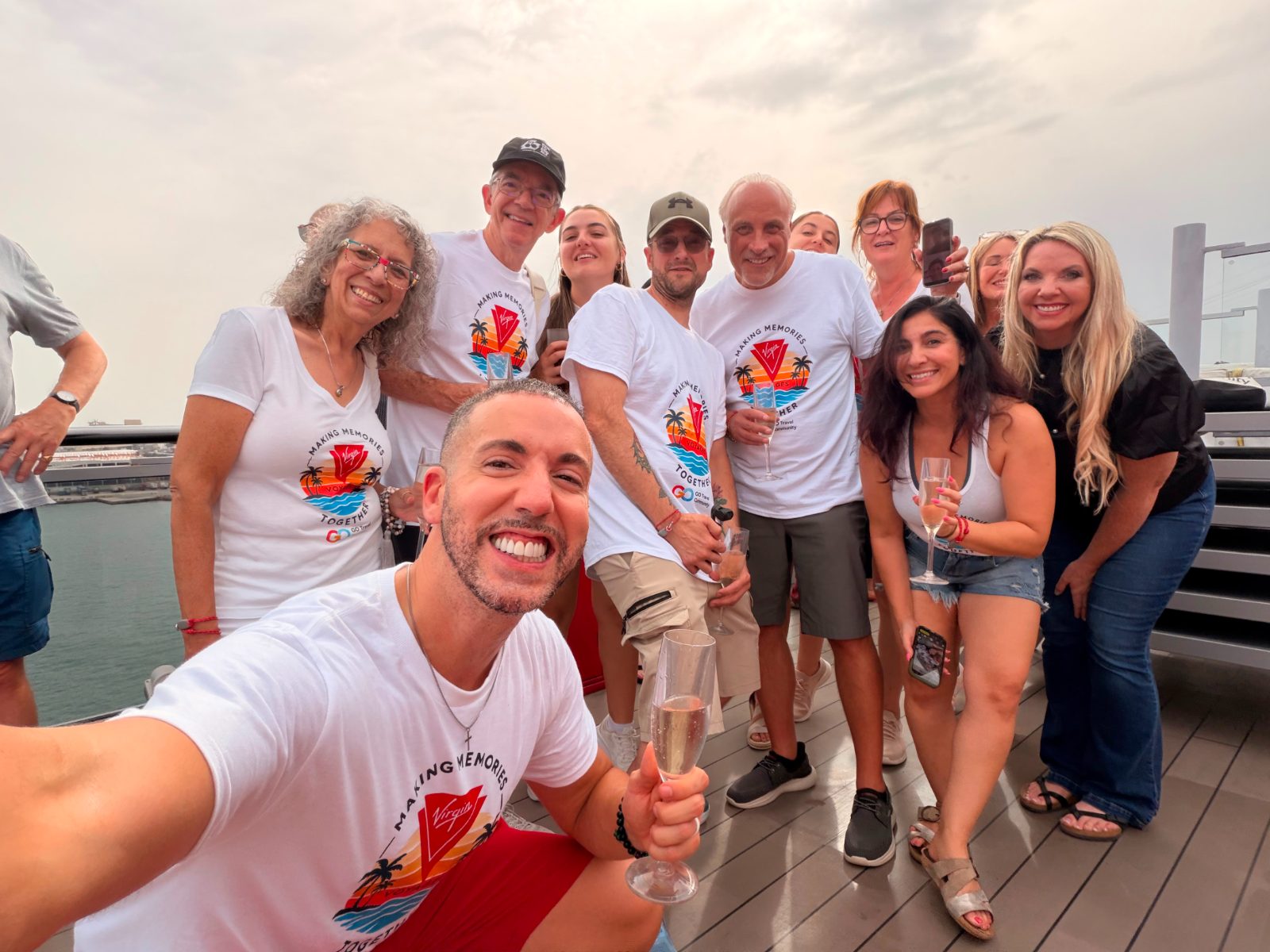 Group in Making Memories Together shirts on the ship's deck